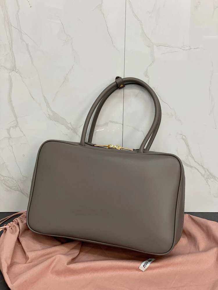 miumiu Original Leather Handheld Official Document Bag for Women 2025 New Large Capacity Retro Under